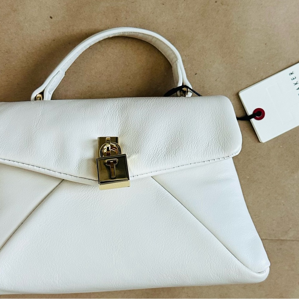 Ted Baker London White Satchel with Elegant Gold Accents